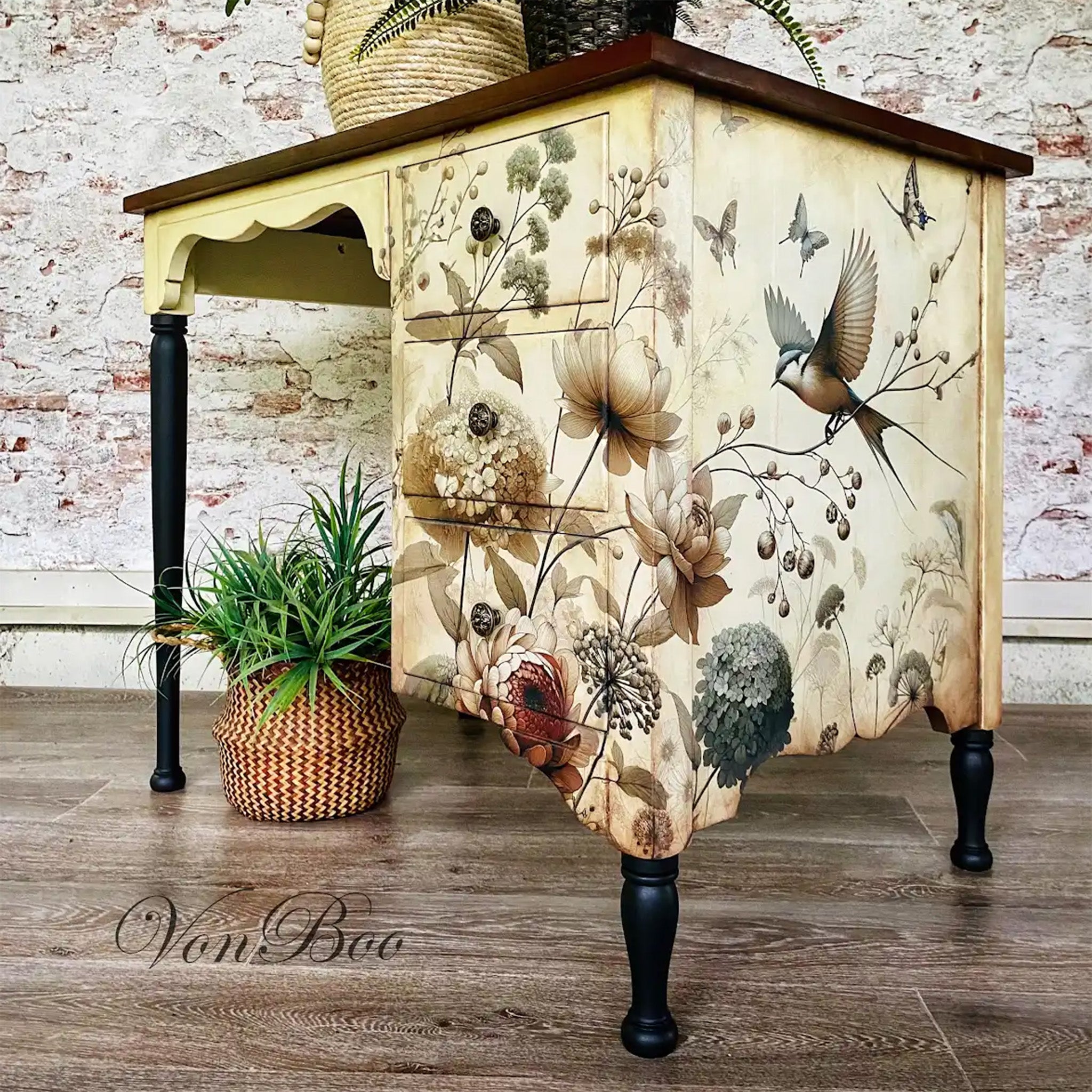 A vintage desk refurbished by Von Boo features Mint by Michelle's Pale Blossoms decoupage paper wrapped from the front right to right side.