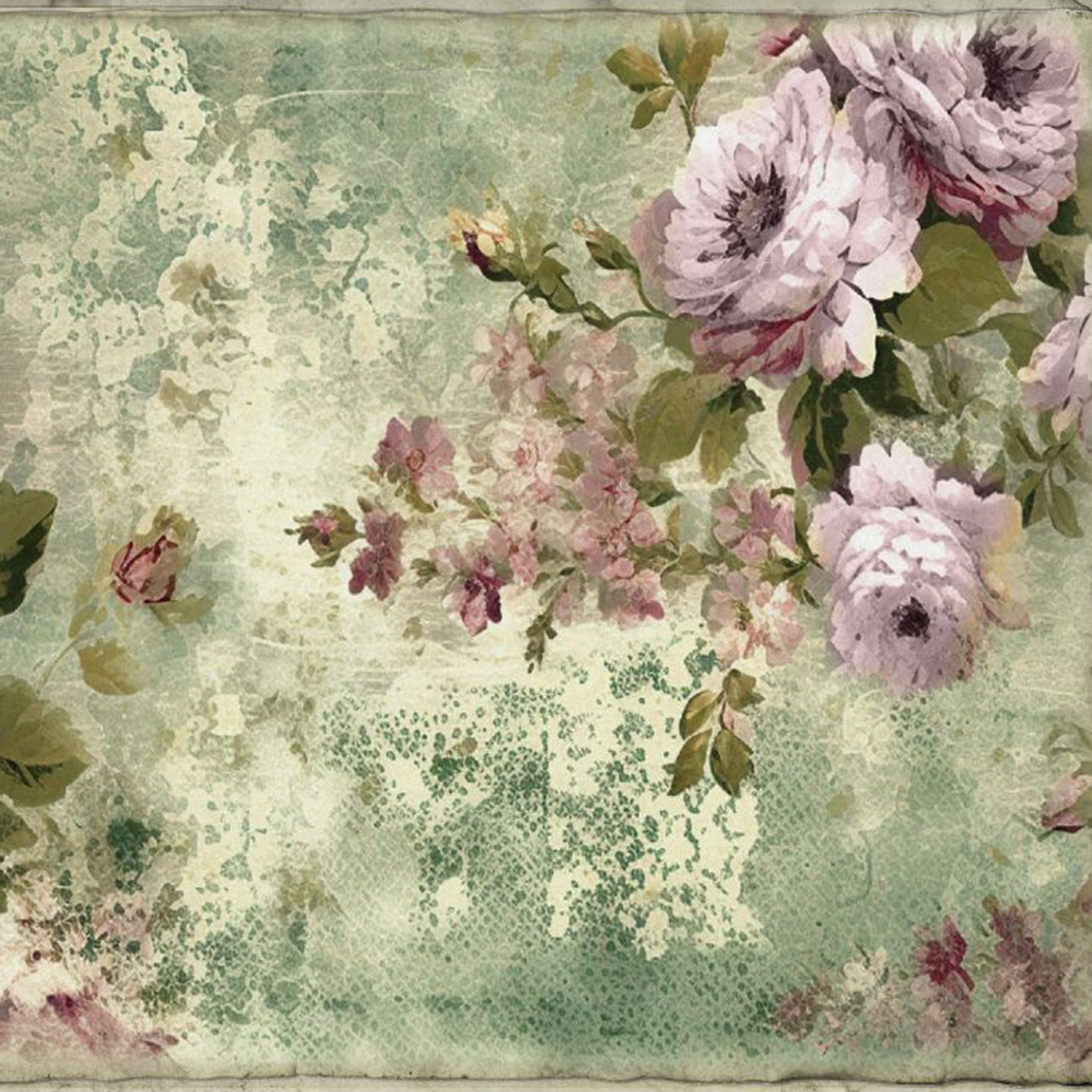 Close-up of a tissue paper design featuring clusters of lavender colored flowers against a distressed light sage background. 