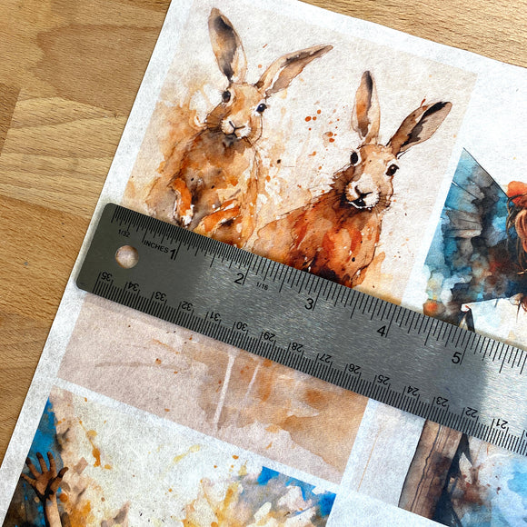 A close-up of Decoupage Queen's Four Abundance Scenes A4 rice paper shows a silver ruler over one of the designs showing a measurement of 4 inches across.