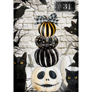 Stack of Halloween-themed pumpkins with black cats and a ghost on a white brick wall background.
