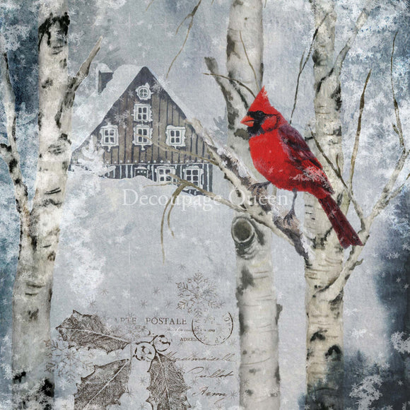 Close-up of a rice paper featuring a charming scene of a cardinal nestled in a birch tree against a snowy backdrop.