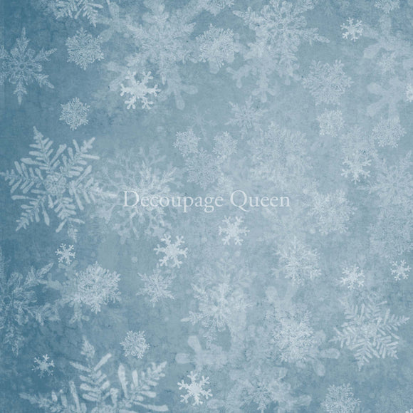 Close-up of a rice paper design featuring a beautiful winter blue background full of snowflakes.