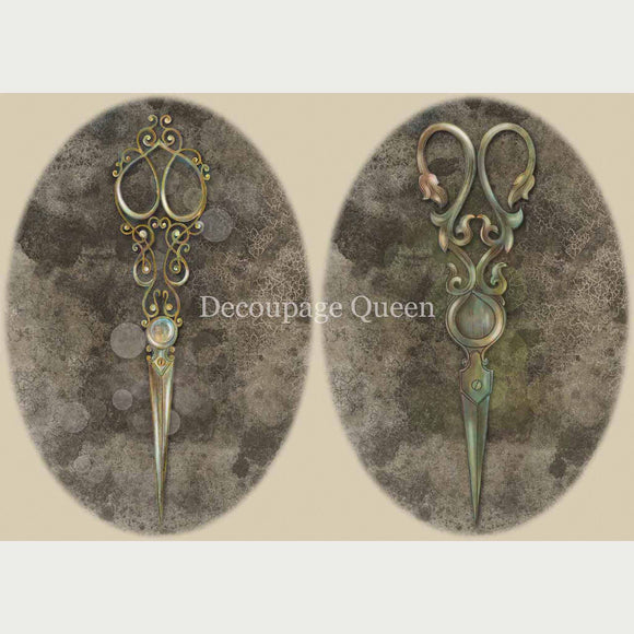 Rice paper featuring 2 oval images of ornate seamstress scissors. 