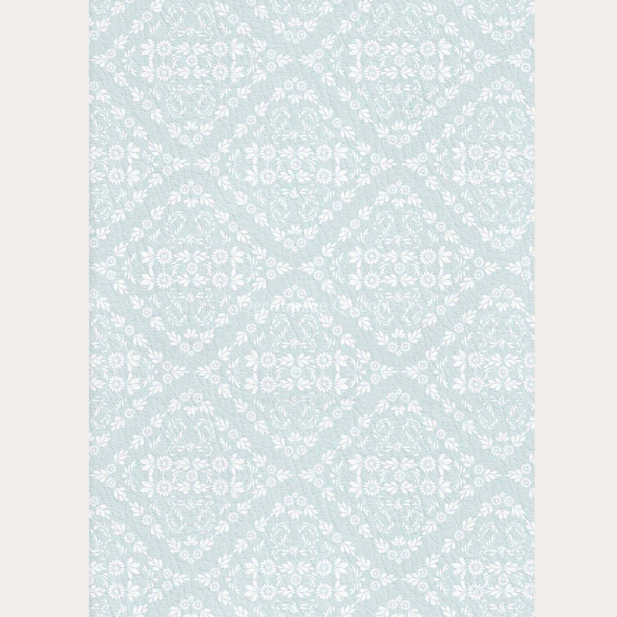 A3 rice paper that features quilted diamonds of dainty white flowers sit against a light blue background. Light beige borders are on the sides.