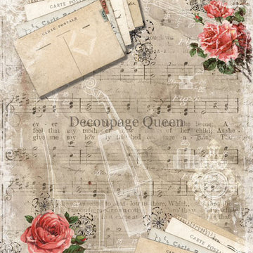 Close-up of a rice paper featuring vintage sheet music, delicate pink floral accents and charming notecards. 