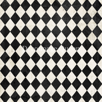 Close-up of a rice paper that features a classic black and white harlequin diamond pattern.