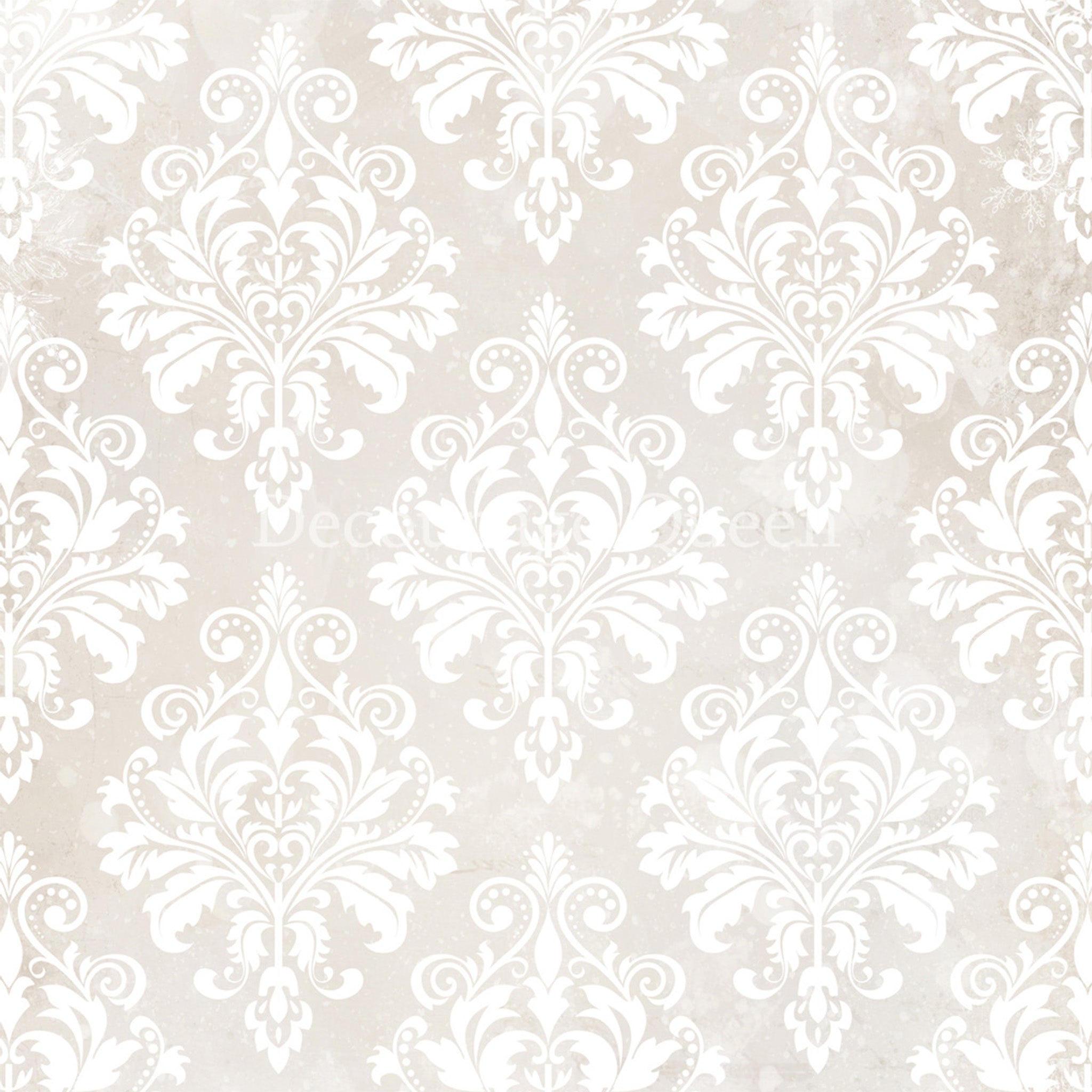 Close-up of a rice paper that features an ornate damask pattern against a soft cream background.