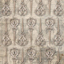 Close-up of a rice paper featuring a repeating design of antique sewing scissors over a faint backdrop of other atelier images.