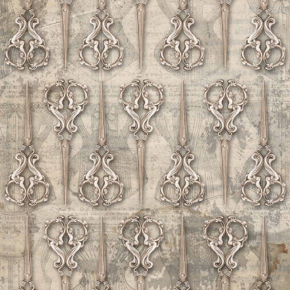 Close-up of a rice paper featuring a repeating design of antique sewing scissors over a faint backdrop of other atelier images.
