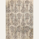 Rice paper featuring a repeating design of antique sewing scissors over a faint backdrop of other atelier images. White borders are on the sides.