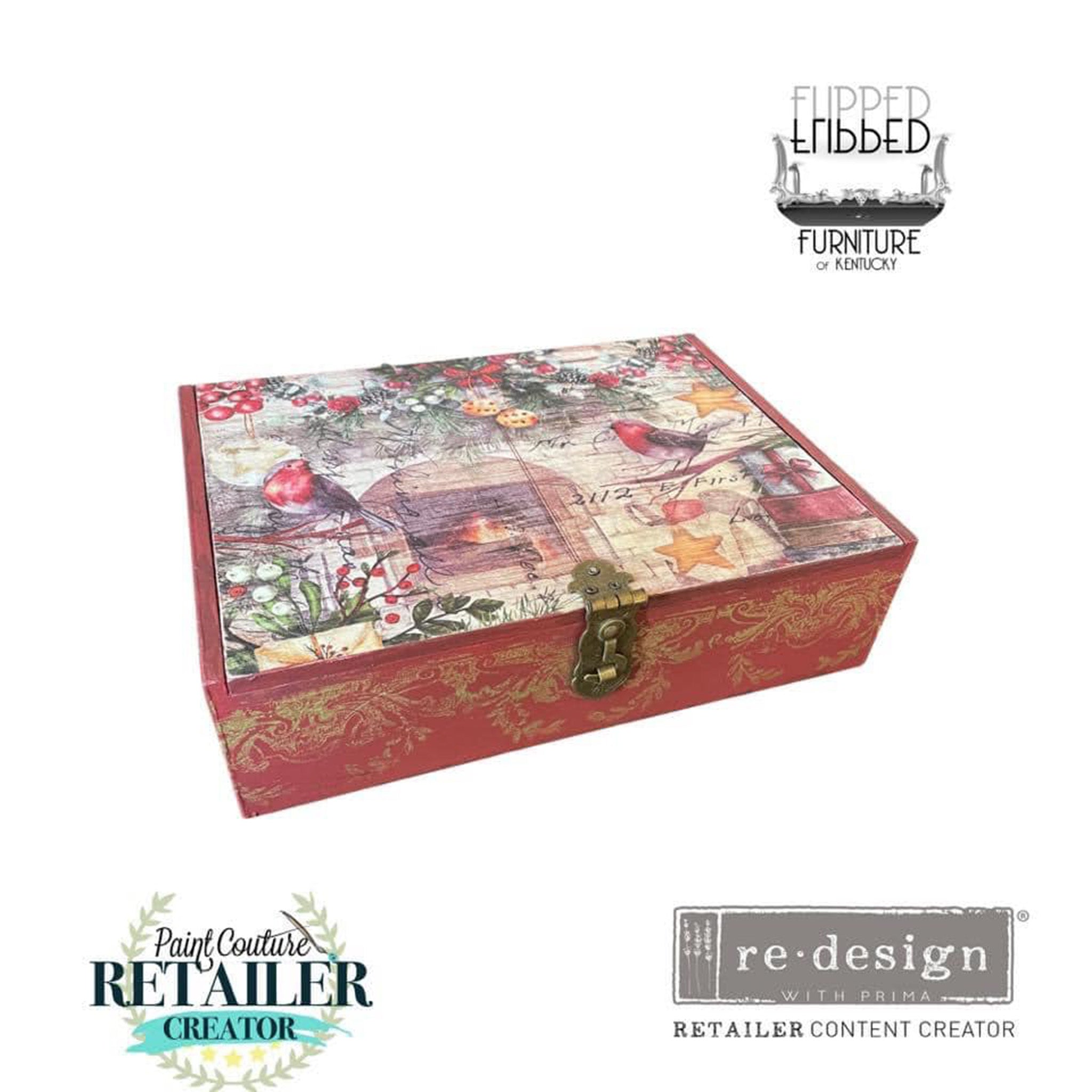 A small wood box created by Flipped Furniture of Kentucky is painted dark bard red and features Decoupage Queen's Festive Robins rice paper on the lid.