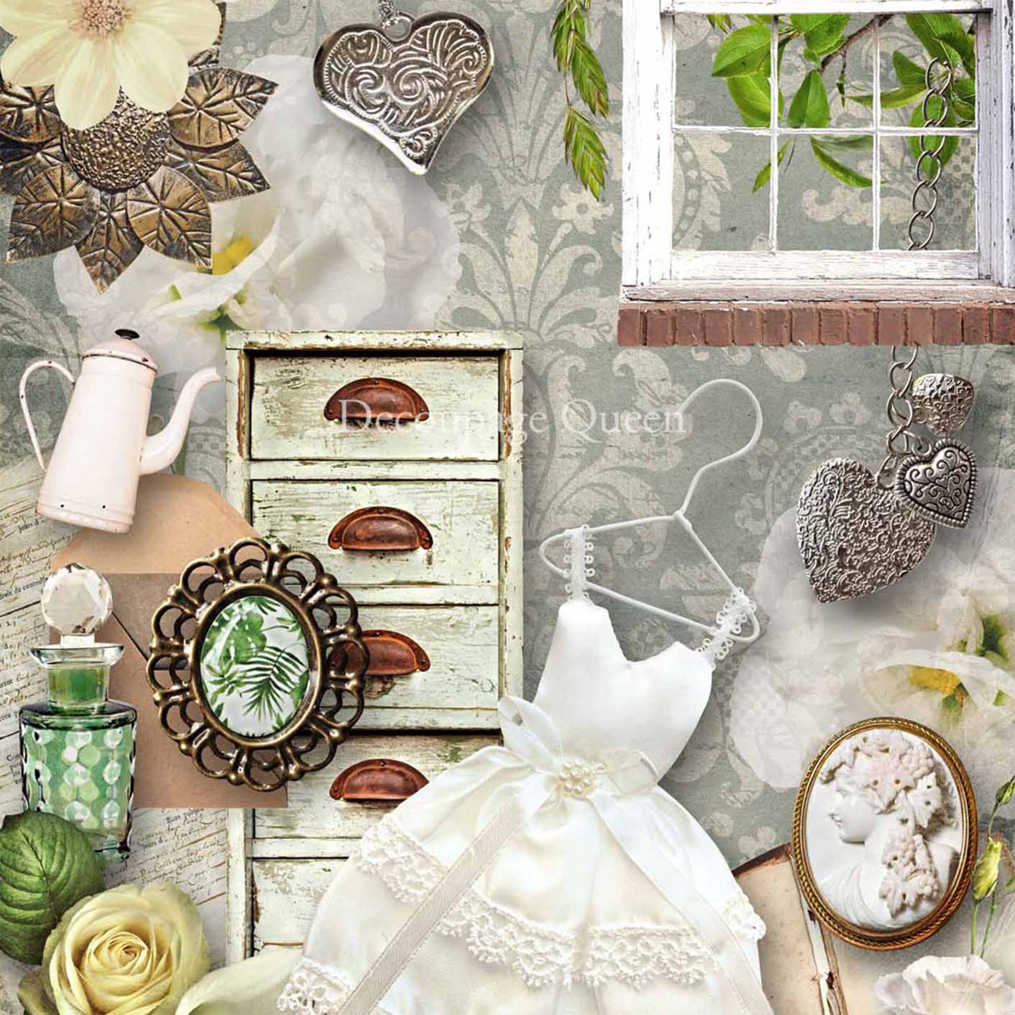 Close-up of a rice paper design that features a collage of silver heart necklaces, a girls white dress on a hanger, a perfume bottle, a distressed vintage chest dresser, a white 12 pane vintage window, and white flowers against a damask wallpaper. 