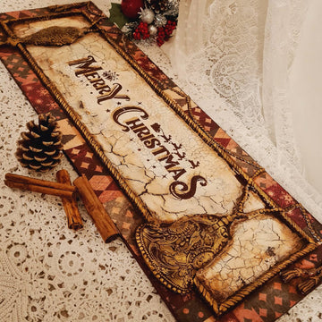 A Christmas decor sign features Decoupage Queen's Holiday Wrapping rice paper on it.