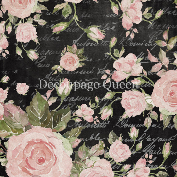 Close-up of a rice paper that features light pink watercolor roses and delicate script writing on a black background.