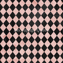 Close-up of a rice paper that featuring a soft pink and black harlequin diamond pattern. 