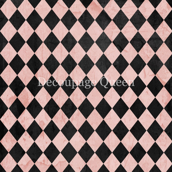 Close-up of a rice paper that featuring a soft pink and black harlequin diamond pattern. 