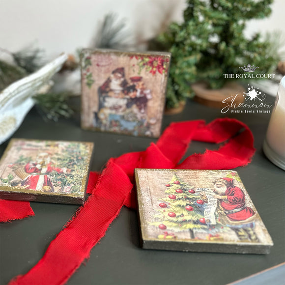 Three wood coasters features Decoupage Queen's Santa's List A4 rice paper on them.