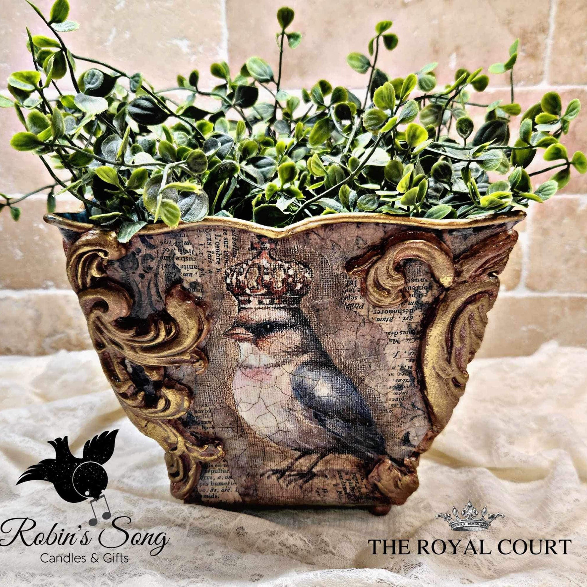 A 4 sided planter refurbished by Robin's Song Candles & Gifts features 1 of Decoupage Queen's The Four Birds rice paper designs on it. 