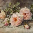 Close-up of a rice paper that features a romantic design of pink roses with French print and script writing.