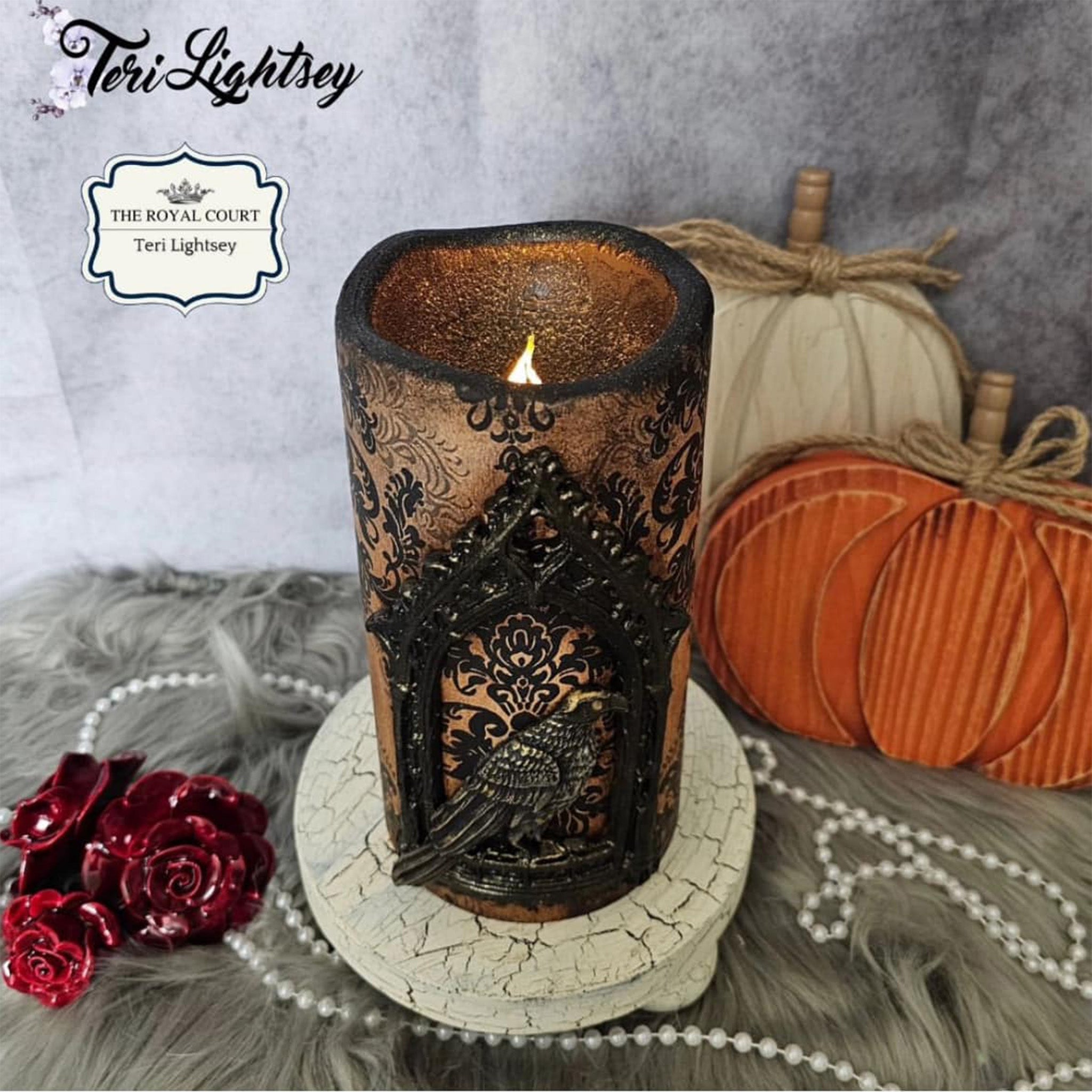 A tealight candle holder created by Teri Lightsey features a black painted casting created from Decoupage Queen's Gothic Window silicone mold.