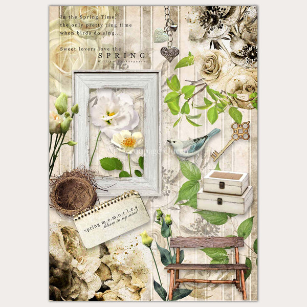A3 rice paper design that features a collage of flowers, a blue bird, vintge key, birds nest, and a weathered bench against a light striped background. White borders are on the sides.