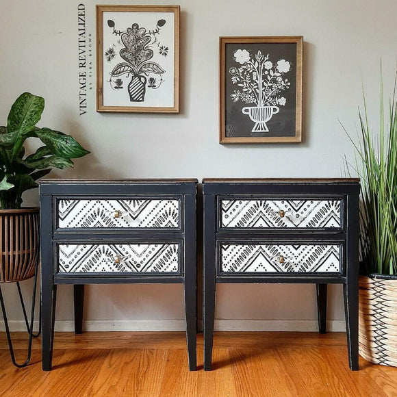 Two vintage 2-drawer night stands refurbished by Vintage Revitalized by Tina Brown feature Dixie Belle's Anchor Silk All-In-One Mineral Paint and a black and white design on the drawers.