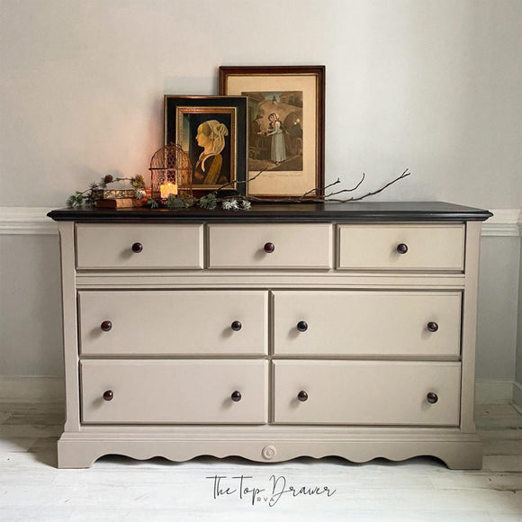 A 7-drawer dresser refurbished by The Top Drawer features Dixie Belle's Badlands Silk All-In-One Mineral Paint.