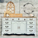 A large buffet table refurbished by Perception an eye for Treasures features Dixie Belle's Baja Gray Silk All-In-One Mineral Paint.