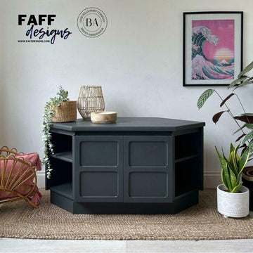 A vintage large hexagonal coffee table with shelves and cubbies refurbished by Faff Designs features Dixie Belle's Black Sands Silk All-In-One Mineral Paint.