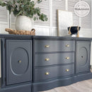 A large dresser with 3-drawers and 2 doors refurbished by My Little Makeovers features Dixie Belle's Black Sands Silk All-In-One Mineral Paint.