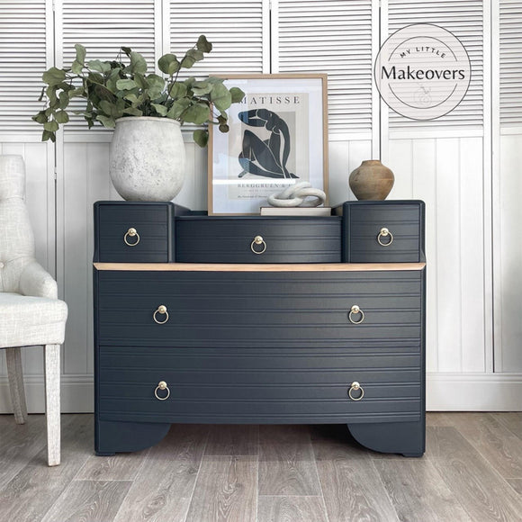 A large 5-drawer dresser refurbished by My Little Makeovers features Dixie Belle's Black Sands Silk All-In-One Mineral Paint.