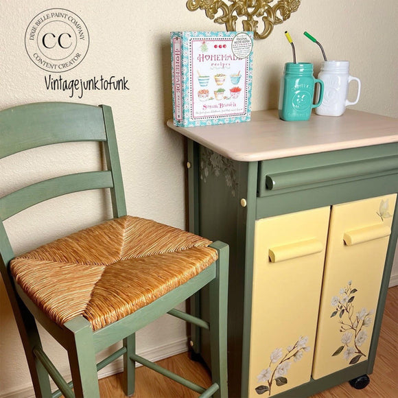 A vintage rolling bar cart and wood counter chair refurbished by Vintage Junk to Funk feature Dixie Belle's Cactus Silk All-In-One Mineral Paint.