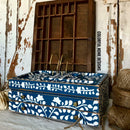 A vintage table top jewelry box refurbished by Colorful Home Designs features Dixie Belle's Cape Current Silk All-In-ne Mineral Paint with a white floral stencil design.