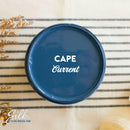 An arial view of an open container of Dixie Belle Paint Company's Cape Current Silk All-In-One Mineral Paint is shown with white text reading Cape Current.