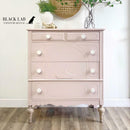 A vintage lingerie chest dresser refurbished by Black Lab Furniture Revival features Dixie Belle's Conch Silk All-In-One Mineral Paint.