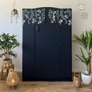An armoire refurbished by Cherubs Chalks Interiors features Dixie Belle's Deep Sea Silk All-In-One Mineral Paint.