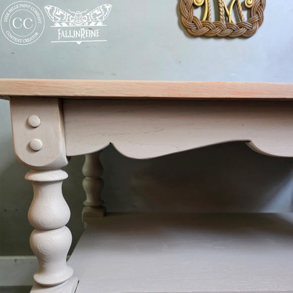 Wooden table with a light finish on a gray background, featuring the 'FallinRene' brand.