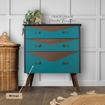 A modern mid century 3-drawer nightstand refurbished by Gracie's House Painted Furniture features Dixie Belle's Mirage Silk All-In-One Mineral Paint with natural wood accents.