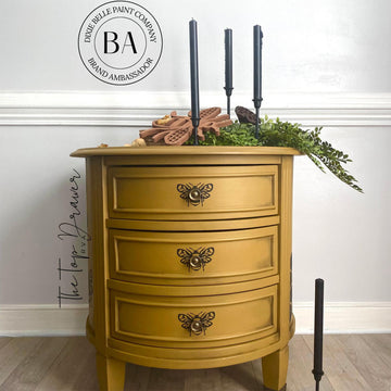 A vintage 3-drawer nightstand refurbished by The Top Drawer features Dixie Belle's Mojave Silk All-In-One Mineral Paint.