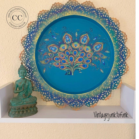 A decorative round wood decor with hand painted artsy peacock feathers created by Vintage Junk to Funk features Dixie Belle's Oasis Silk All-In-One Mineral Paint.