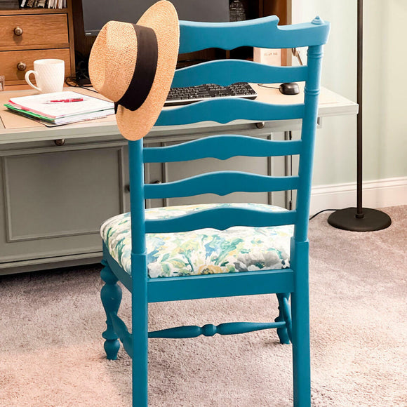 A wood chair features Dixie Belle's Oasis Silk All-In-One Mineral Paint.