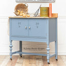 A vintage bar cabinet refurbished by Lotus Theory Designs features Dixie Belle's Quiet Cove Silk All-In-One Mineral Paint.