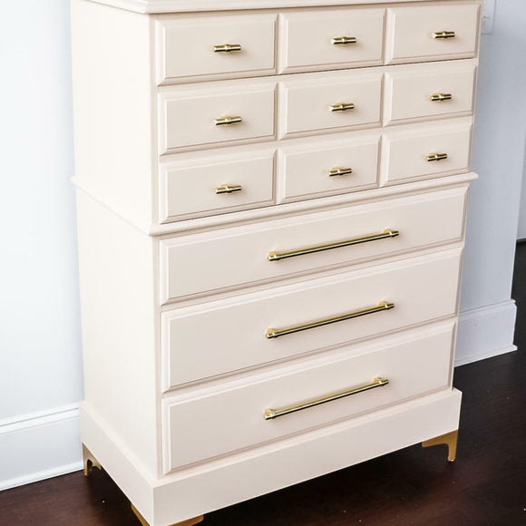 A large 5-drawer chest dresser features Dixie Belle's Sand Castle Silk All-In-One Mineral Paint.