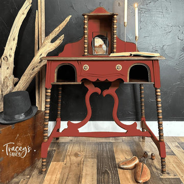 A vintage vanity desk refurbished by Tracey's Fancy features Dixie Belle's Sequoia Silk All-In-One Mineral Paint.