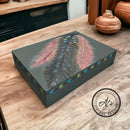 A wood box with hand painted feathers refurbished by AJ's Vintage Designs features Dixie Belle's Smoky Mountains Silk All-In-One Mineral Paint.
