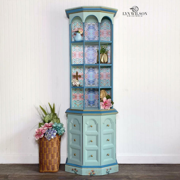 A vintage tall skinny hutch refurbished by Lyn Wilson Originals features Dixie Belle's Tide Pool Silk All-In-One Mineral Paint.
