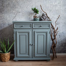 A small buffet cabinet refurbished by L&L Furniture Art features Dixie Belle's Wharf Silk All-In-One Mineral Paint.