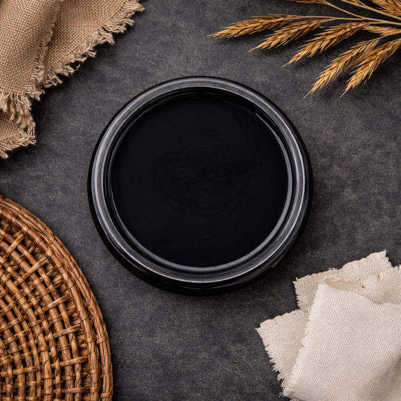 An arial view of an open container of Dixie Belle Paint Company's Caviar Chalk Mineral Paint 