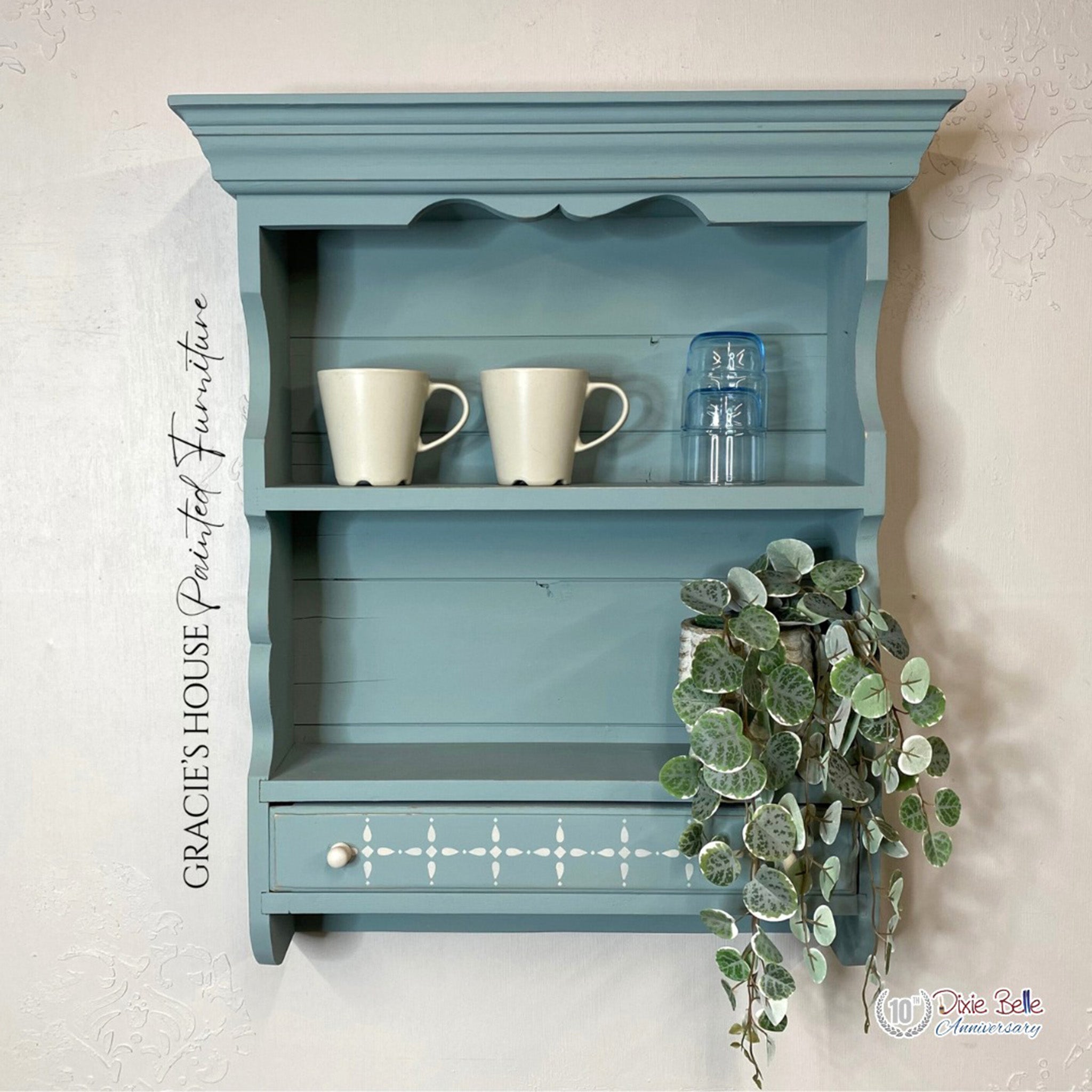 A vintage small hutch style wall shelf refurbished by Gracie's House Painted Furniture is painted in Dixie Belle's Vintage Duck Egg chalk mineral paint.