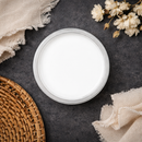 An arial view of an open container of Dixie Belle Paint Company’s Cotton Chalk Mineral Paint i